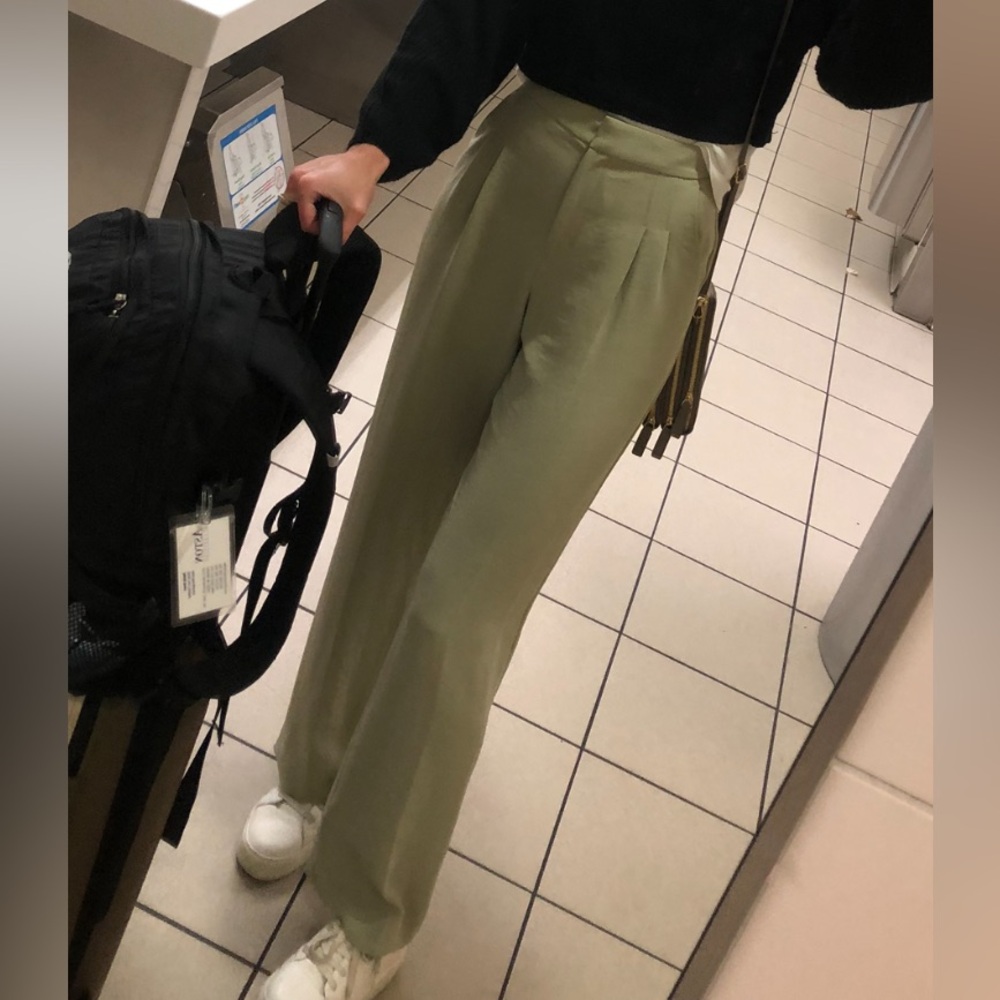 Sage green trousers